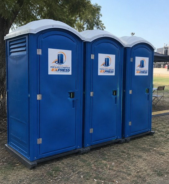 Row of porta potty rentals at an outdoor event in Los Angeles, CA