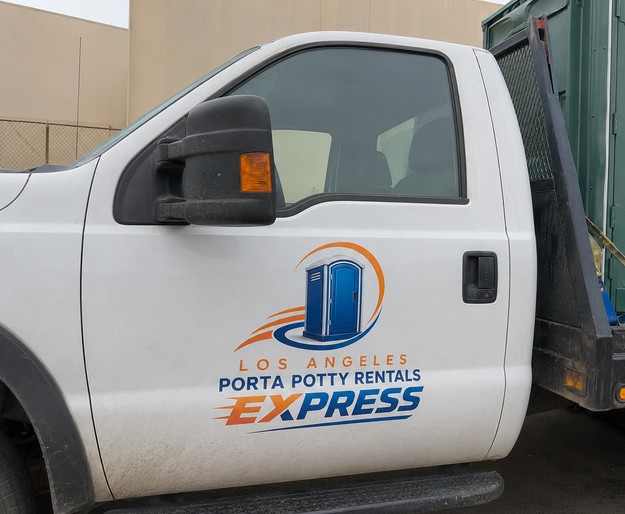 Los Angeles porta potty delivery truck loaded with rental units